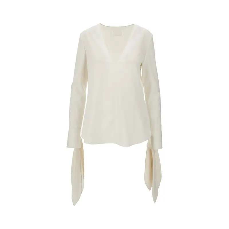Blusa in seta con polsini annodati