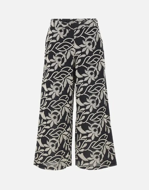 Pantaloni con ricamo floreale